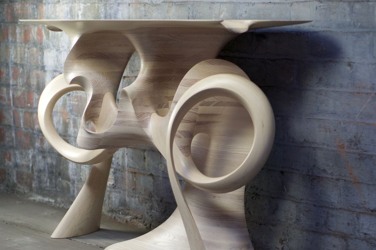 Ash Console — a base of carved interlocking rings