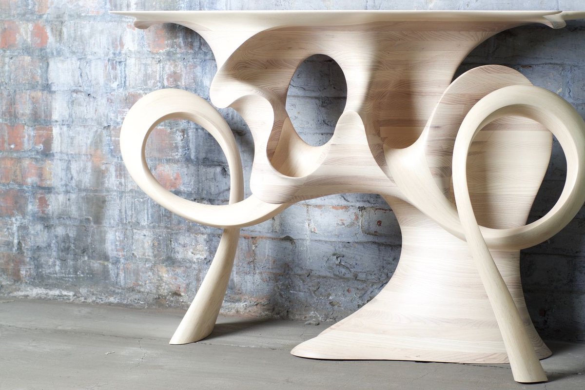 Ash Console — a base of carved interlocking rings