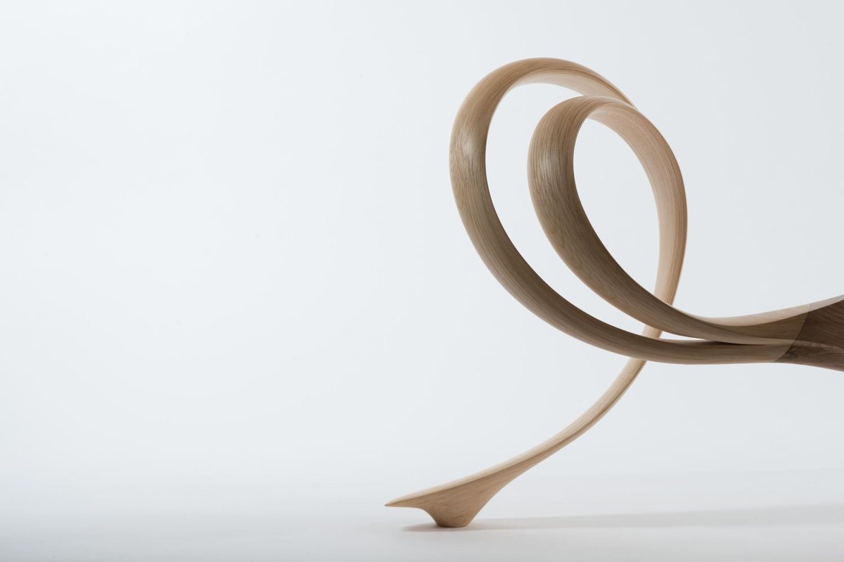 Roxanne — a console with a lobed top on a carved pedestal