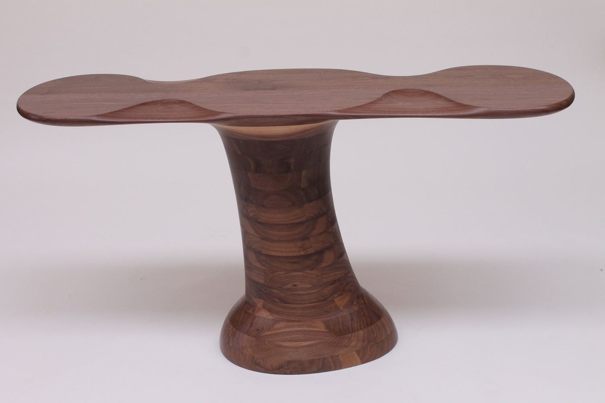 Wallflower — a walnut side table with a lobed top