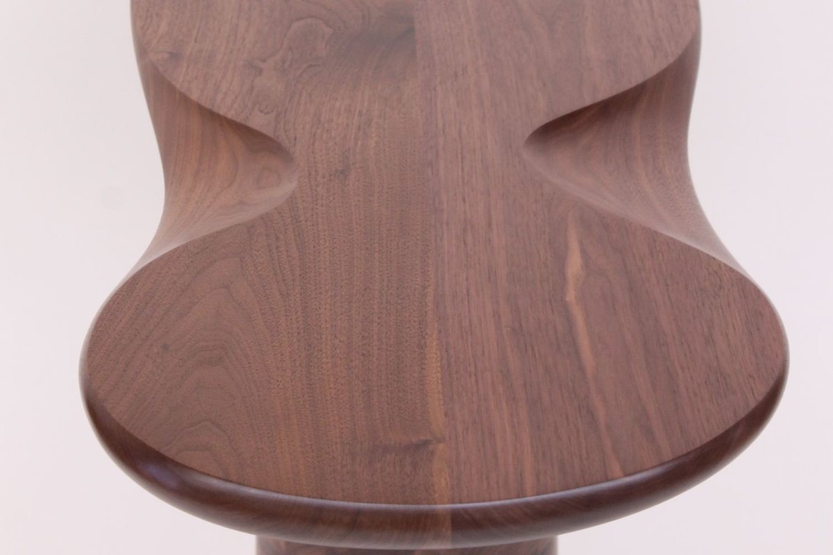 Wallflower — a walnut side table with a lobed top
