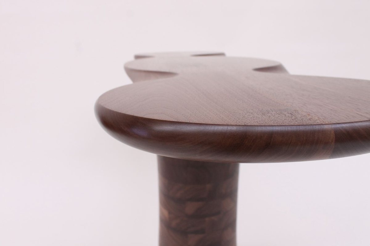 Wallflower — a walnut side table with a lobed top