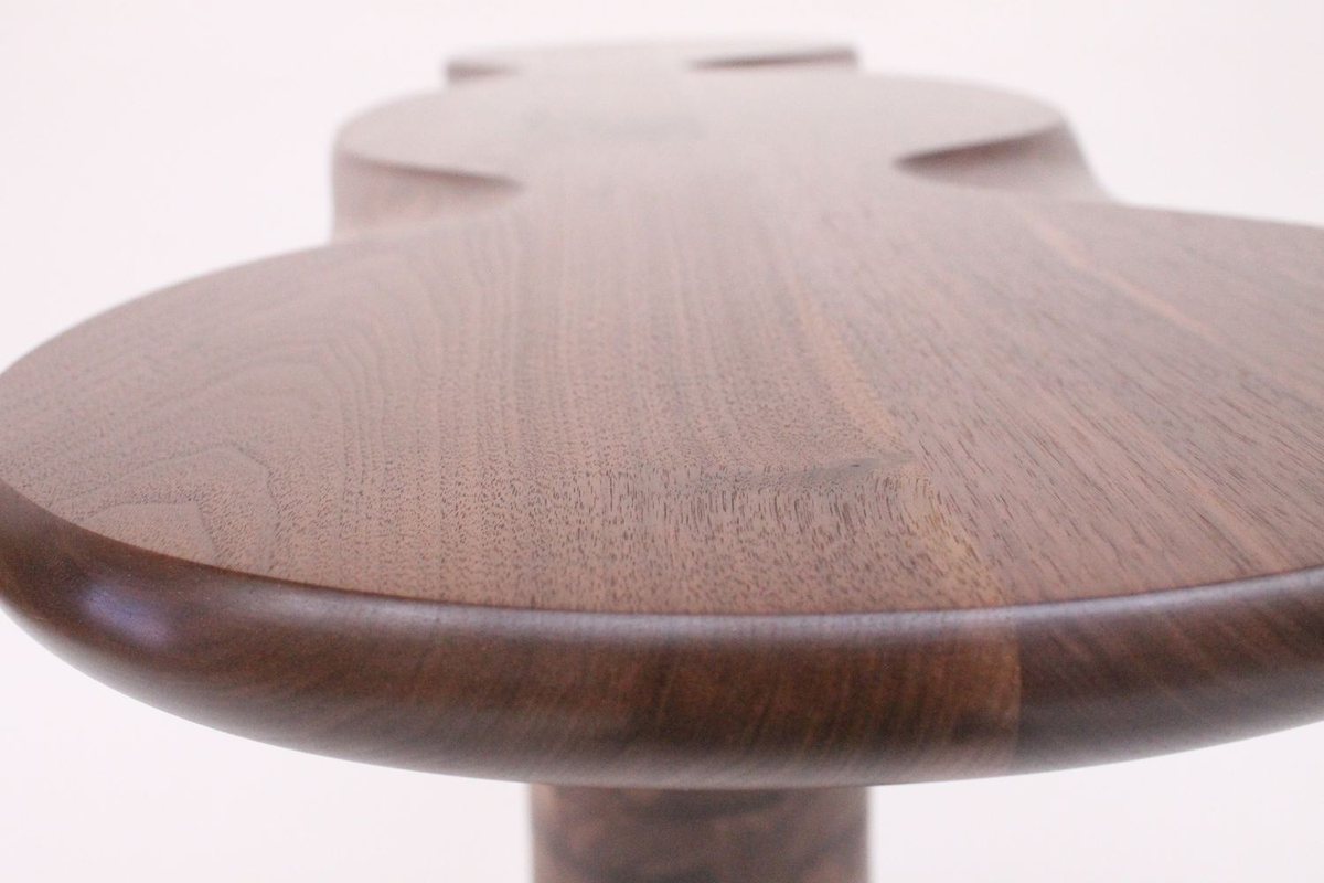 Wallflower — a walnut side table with a lobed top